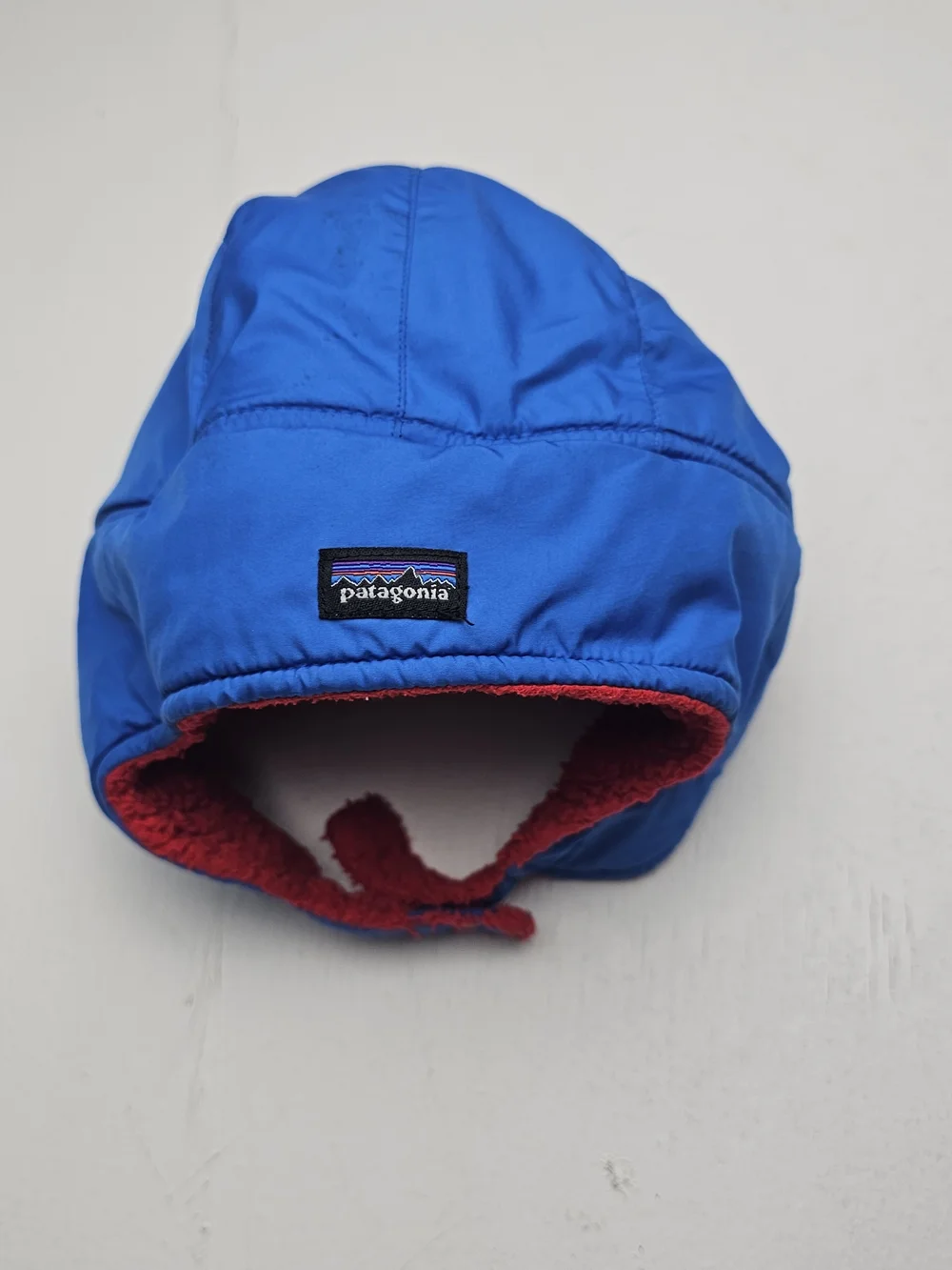 Patagonia Infant Blue and Red Trapper Hat with Sherpa Lining